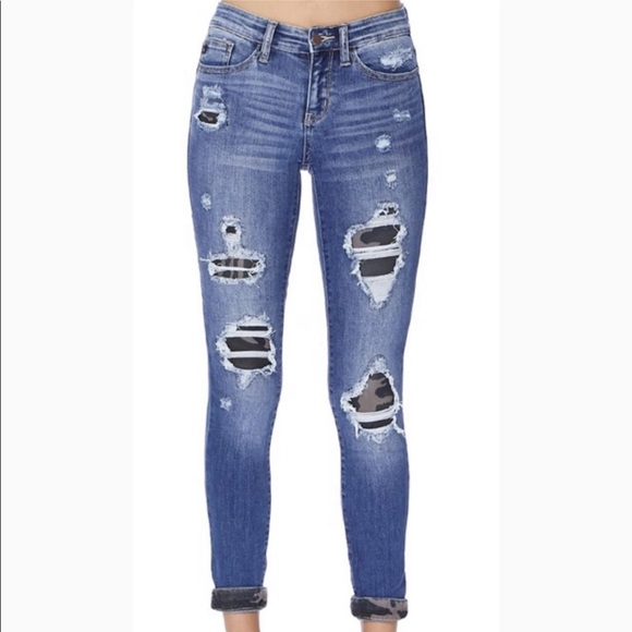 ripped jeans with camo patches